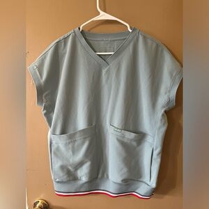 Mediclo Stone Blue ribbed scrub top. Great condition, worn twice. Size S